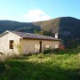 Exterior view of farmhouse Casale Noro with land near Spello: farmhouse for sale in Umbria, Italy